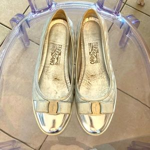 Silver ferragamo flats used good condition